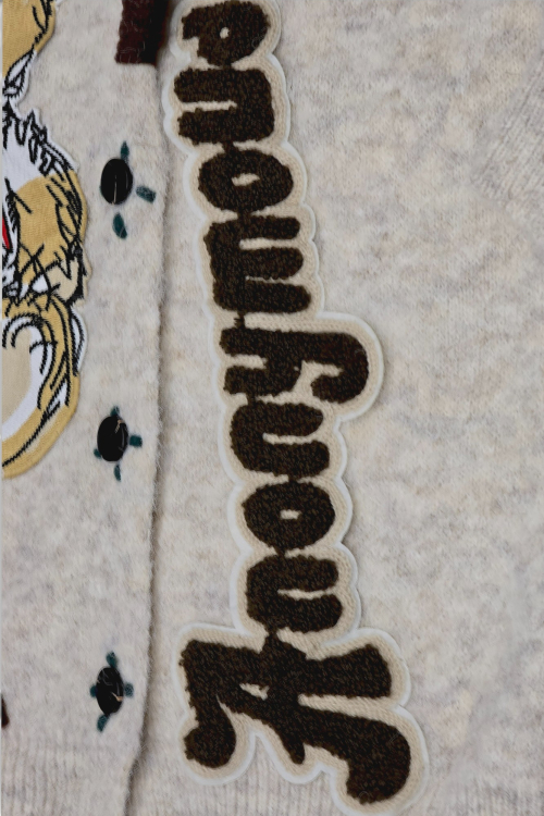 Ženski bež džemper na kopčanje Bindi s V-izrezom i aplikacijom medvjedića